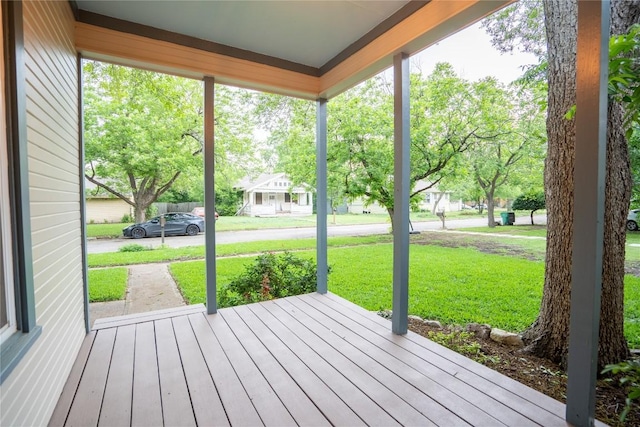 913 Fowzer St, Taylor, TX 76574 - wooden terrace featuring a porch and a yard