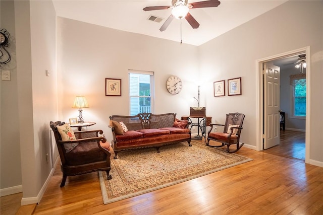 913 Fowzer St, Taylor, TX 76574 - living room featuring visible vents, a ceiling fan, and light wood-type flooring