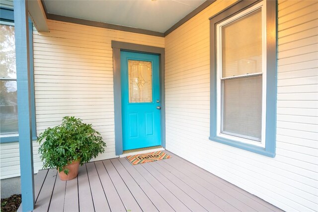 913 Fowzer St, Taylor, TX 76574 - view of exterior entry featuring a porch