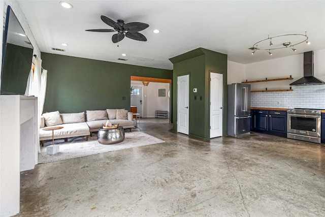 245 Country Ln, Mcdade, TX 78650 - living area featuring a ceiling fan, recessed lighting, visible vents, and concrete floors