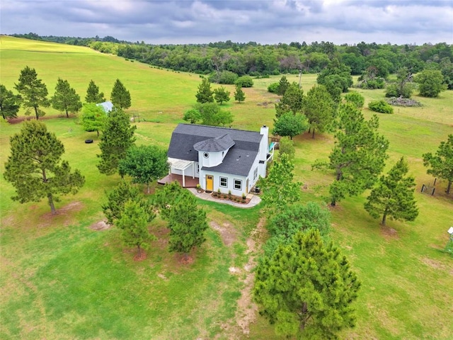 birds eye view of property featuring a rural view