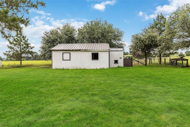 245 Country Ln, Mcdade, TX 78650 - view of pole building featuring a yard