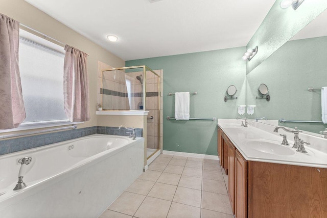 1564 Lorson Loop, Round Rock, TX 78665 - full bathroom featuring a bath, a shower stall, tile patterned floors, and double vanity