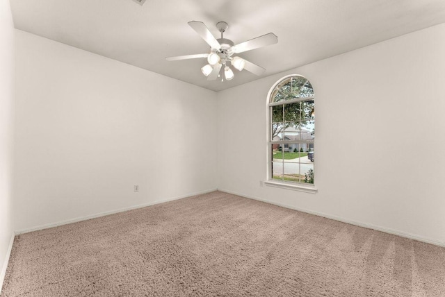 1564 Lorson Loop, Round Rock, TX 78665 - carpeted empty room featuring a ceiling fan and baseboards