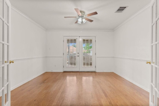 1564 Lorson Loop, Round Rock, TX 78665 - unfurnished room with french doors, light wood-type flooring, ceiling fan, and crown molding
