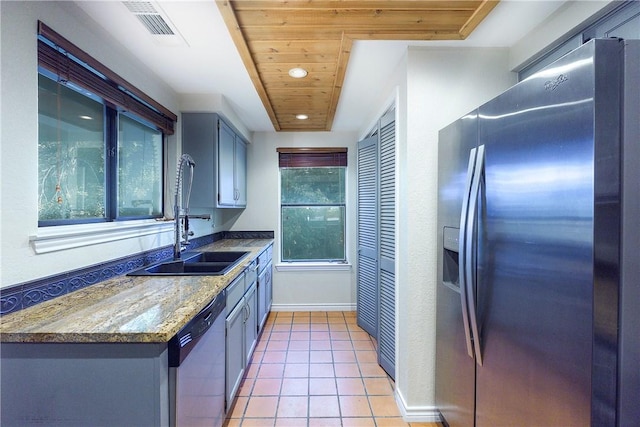 kitchen with wood ceiling, visible vents, appliances with stainless steel finishes, a sink, and recessed lighting