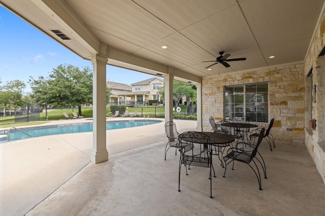 1900 Scofield Ridge Parkway Unit 1903, Austin, TX 78727 - view of patio / terrace featuring ceiling fan, fence, and a fenced in pool