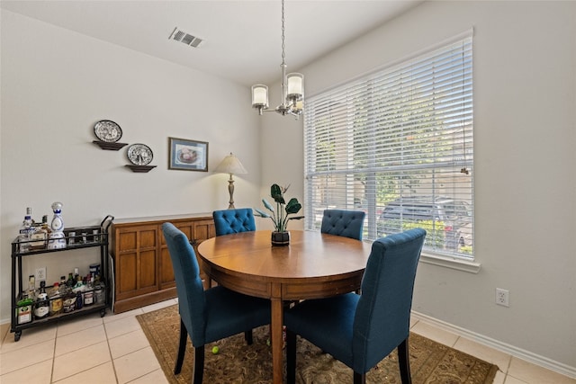 1900 Scofield Ridge Parkway Unit 1903, Austin, TX 78727 - dining space featuring visible vents, light tile patterned floors, a notable chandelier, and a wealth of natural light