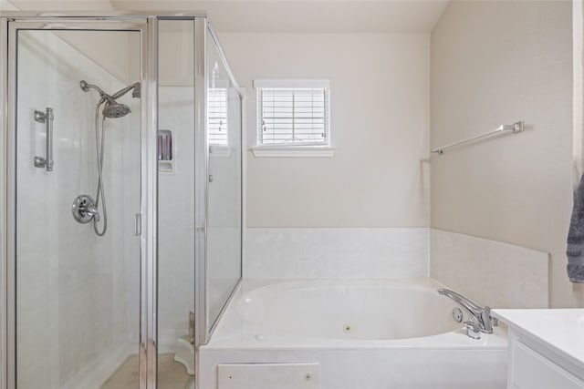 1900 Scofield Ridge Parkway Unit 1903, Austin, TX 78727 - full bathroom with a jetted tub, vanity, and a shower stall