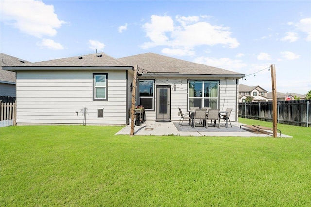 210 Maroon Ln, Kyle, TX 78640 - back of house featuring a fenced backyard and a patio area