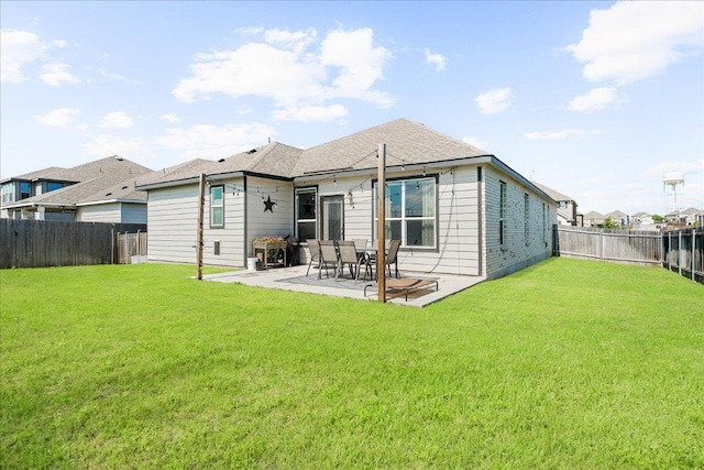 210 Maroon Ln, Kyle, TX 78640 - rear view of house featuring a fenced backyard and a patio area