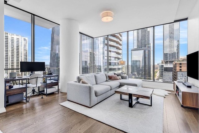 210 Lavaca St Unit 2308, Austin, TX 78701 - living area featuring wood finished floors and floor to ceiling windows