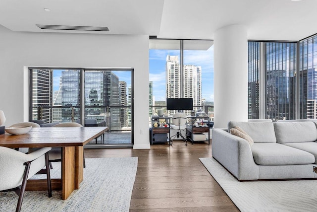 210 Lavaca St Unit 2308, Austin, TX 78701 - living room featuring visible vents and wood finished floors