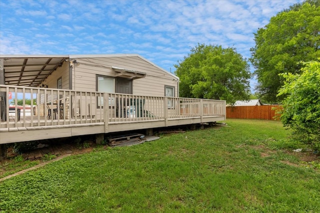 1002 College St, Bastrop, TX 78602 - view of yard featuring fence and a deck