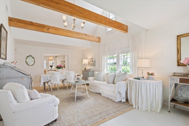 living room featuring a notable chandelier and vaulted ceiling with beams