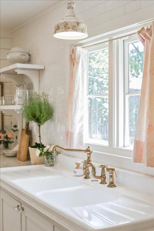 bathroom with vanity and crown molding