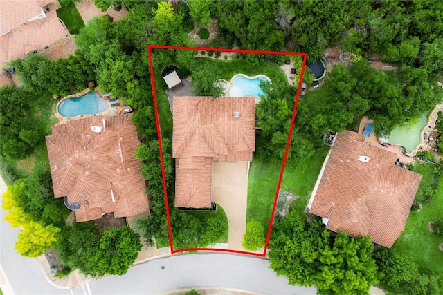 14912 Swallow Tailed Kite Dr, Austin, TX 78738 - aerial view of property and surrounding area with a pool and property parcel outlined
