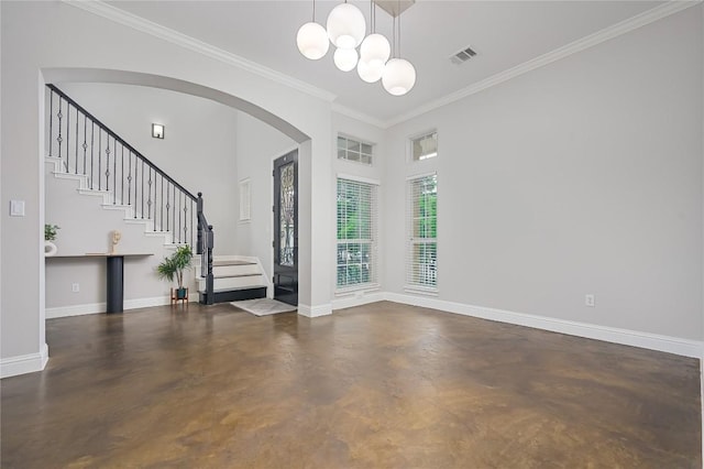 14912 Swallow Tailed Kite Dr, Austin, TX 78738 - unfurnished living room with concrete flooring, stairway, ornamental molding, a chandelier, and arched walkways