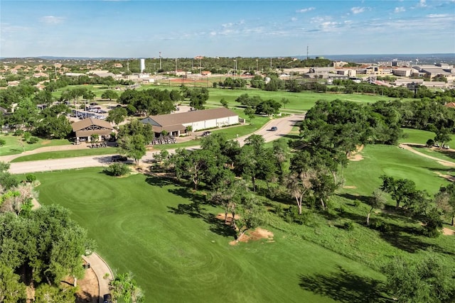 bird's eye view with view of golf course and a residential view