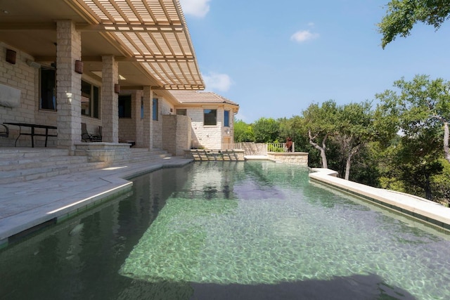 26302 Countryside Dr, Spicewood, TX 78669 - outdoor pool with a patio
