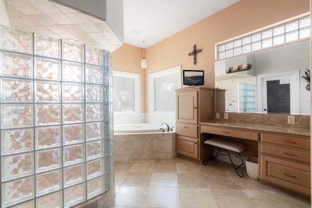 bathroom with walk in shower, a garden tub, and tile patterned floors