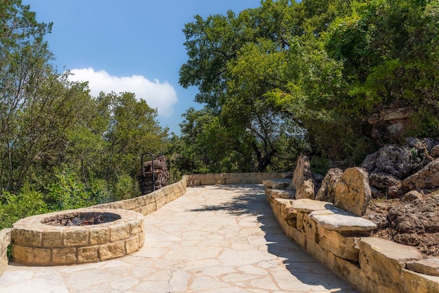 26302 Countryside Dr, Spicewood, TX 78669 - view of patio / terrace featuring a fire pit