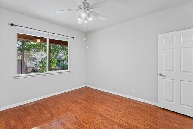 105 Saddle Trl, Georgetown, TX 78633 - empty room featuring baseboards, a ceiling fan, and wood finished floors