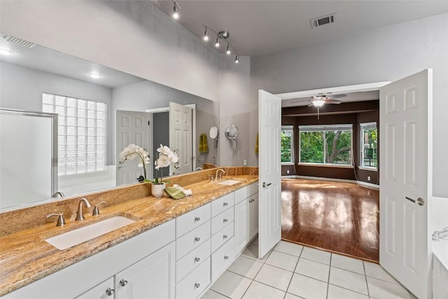 105 Saddle Trl, Georgetown, TX 78633 - bathroom featuring a sink, tile patterned flooring, and visible vents