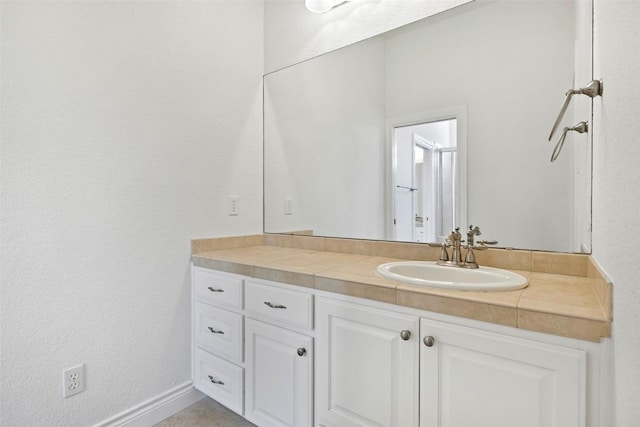 110 Woodall Dr, Georgetown, TX 78628 - bathroom with baseboards and vanity
