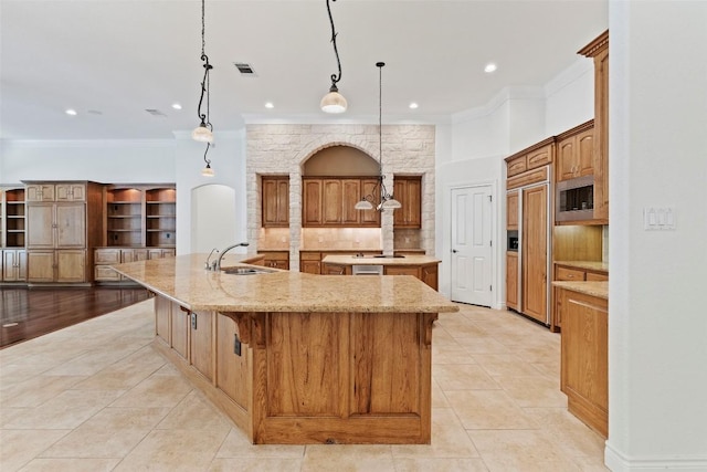 110 Woodall Dr, Georgetown, TX 78628 - kitchen with a large island, ornamental molding, light tile patterned floors, and a sink