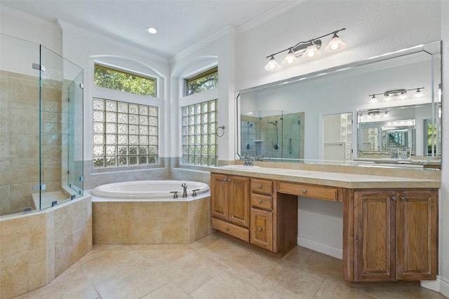 110 Woodall Dr, Georgetown, TX 78628 - bathroom with a shower stall, ornamental molding, a garden tub, and tile patterned floors