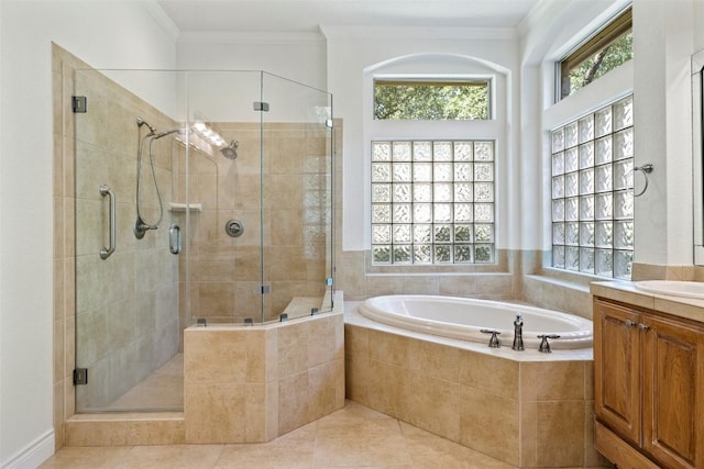 110 Woodall Dr, Georgetown, TX 78628 - full bath with vanity, a bath, plenty of natural light, a shower stall, and ornamental molding