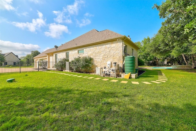110 Woodall Dr, Georgetown, TX 78628 - back of property with stone siding and an attached garage