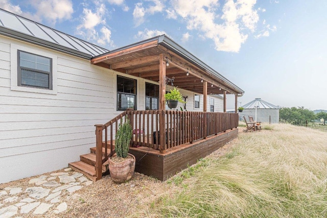 770 Stanton Rd, Johnson City, TX 78636 - rear view of property featuring a standing seam roof and metal roof