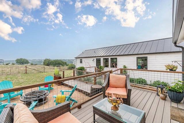 770 Stanton Rd, Johnson City, TX 78636 - wooden terrace with a fire pit