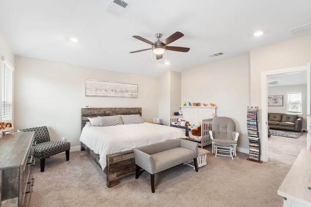 130 Mcginnis Trl, Kyle, TX 78640 - bedroom with light colored carpet, visible vents, and recessed lighting