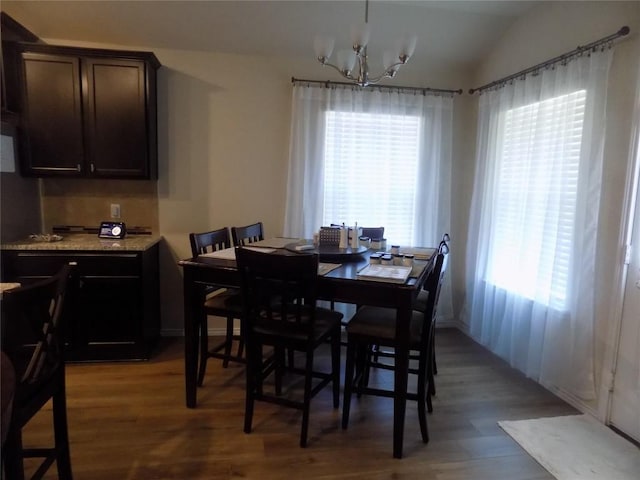 124 Rearden Blvd, Jarrell, TX 76537 - dining room featuring a chandelier, light wood-type flooring, and lofted ceiling
