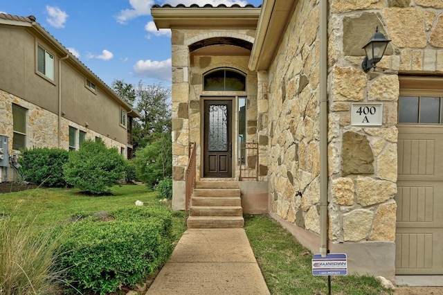 400 Hummingbird Ln Unit A, Austin, TX 78734 - doorway to property with stone siding