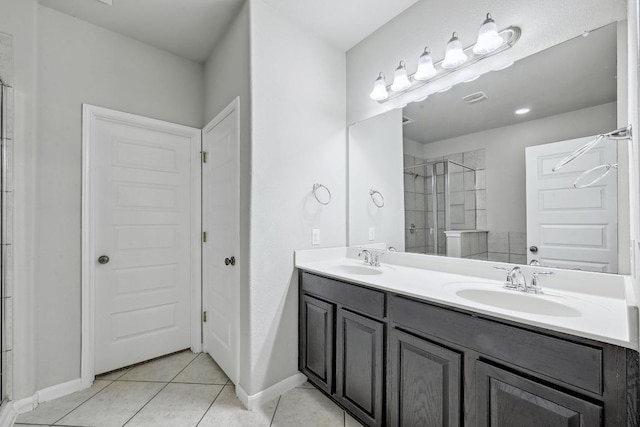 400 Hummingbird Ln Unit A, Austin, TX 78734 - full bath featuring tiled shower, double vanity, and tile patterned floors