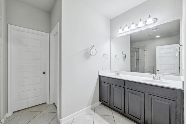 400 Hummingbird Ln Unit A, Austin, TX 78734 - full bath with tile patterned floors, double vanity, and tiled shower