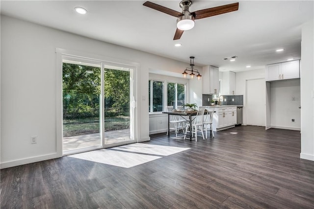 6220 Blarwood Dr, Austin, TX 78745 - living room featuring a ceiling fan, baseboards, dark wood-style floors, and recessed lighting