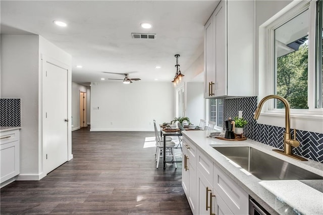 6220 Blarwood Dr, Austin, TX 78745 - kitchen with a sink, a ceiling fan, backsplash, dark wood finished floors, and recessed lighting