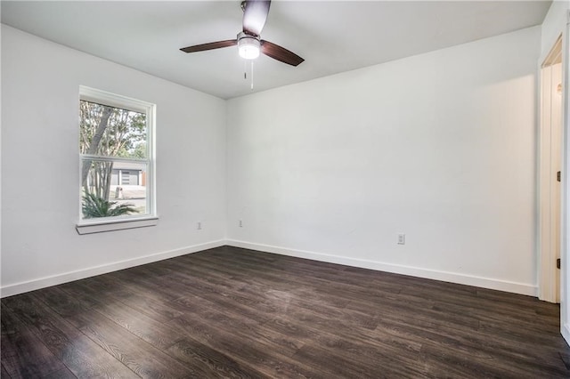 6220 Blarwood Dr, Austin, TX 78745 - spare room featuring a ceiling fan, dark wood-type flooring, and baseboards