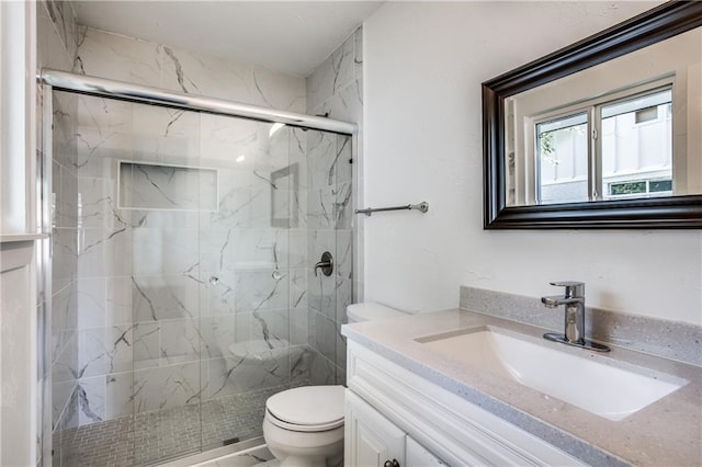 6220 Blarwood Dr, Austin, TX 78745 - bathroom featuring toilet, vanity, and a marble finish shower