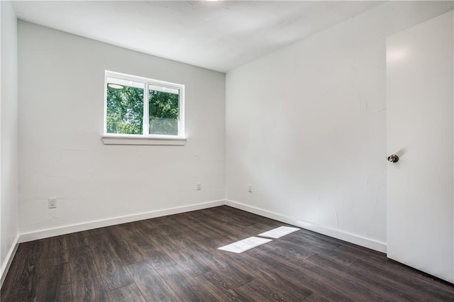 6220 Blarwood Dr, Austin, TX 78745 - unfurnished room with wood finished floors and baseboards