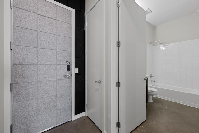 507 Sabine St Unit 503, Austin, TX 78701 - full bathroom with concrete floors, toilet, visible vents, and bathtub / shower combination