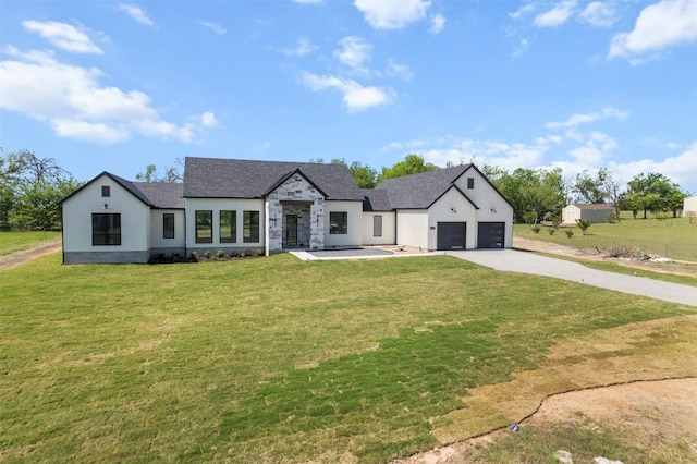 17109 Saint Therese Rd, Manor, TX 78653 - modern farmhouse style home with driveway, a front yard, an attached garage, and stucco siding