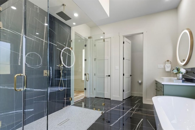 17109 Saint Therese Rd, Manor, TX 78653 - bathroom with a shower stall, a soaking tub, vanity, and recessed lighting
