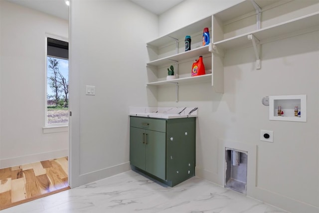 17109 Saint Therese Rd, Manor, TX 78653 - laundry room with hookup for an electric dryer, hookup for a washing machine, and light marble finish floors