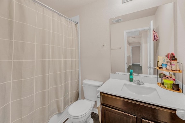 310 Garcitas Creek Ln, Hutto, TX 78634 - full bath with toilet, vanity, and a shower with shower curtain